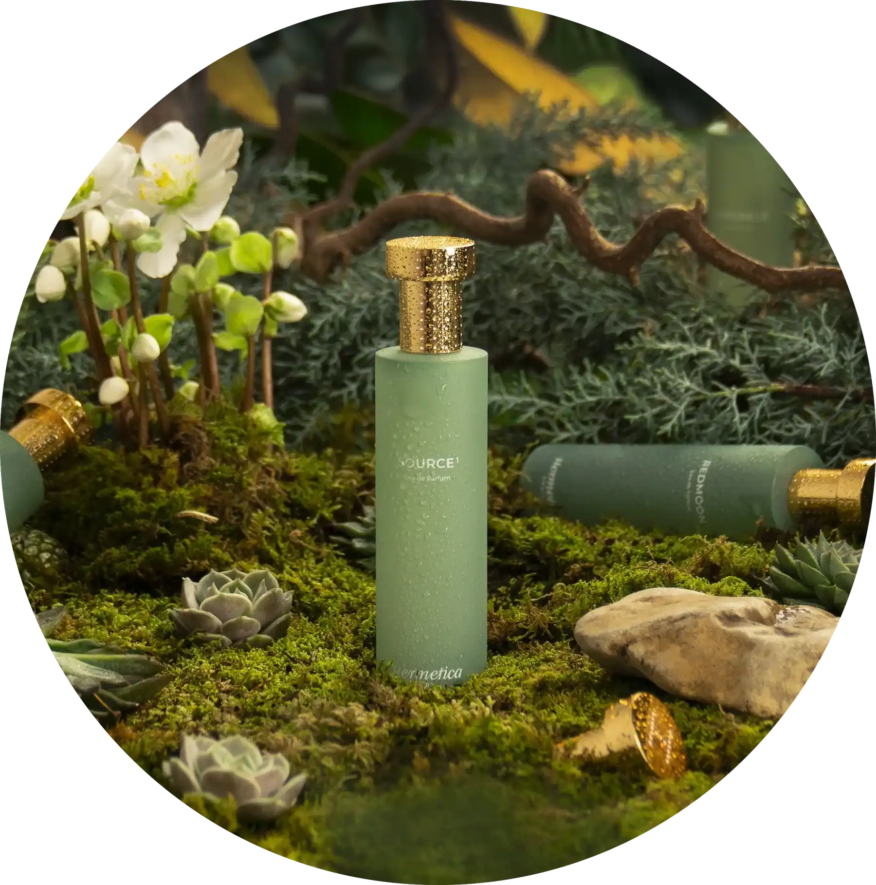 Mint green glass bottle with a gold metallic cap.